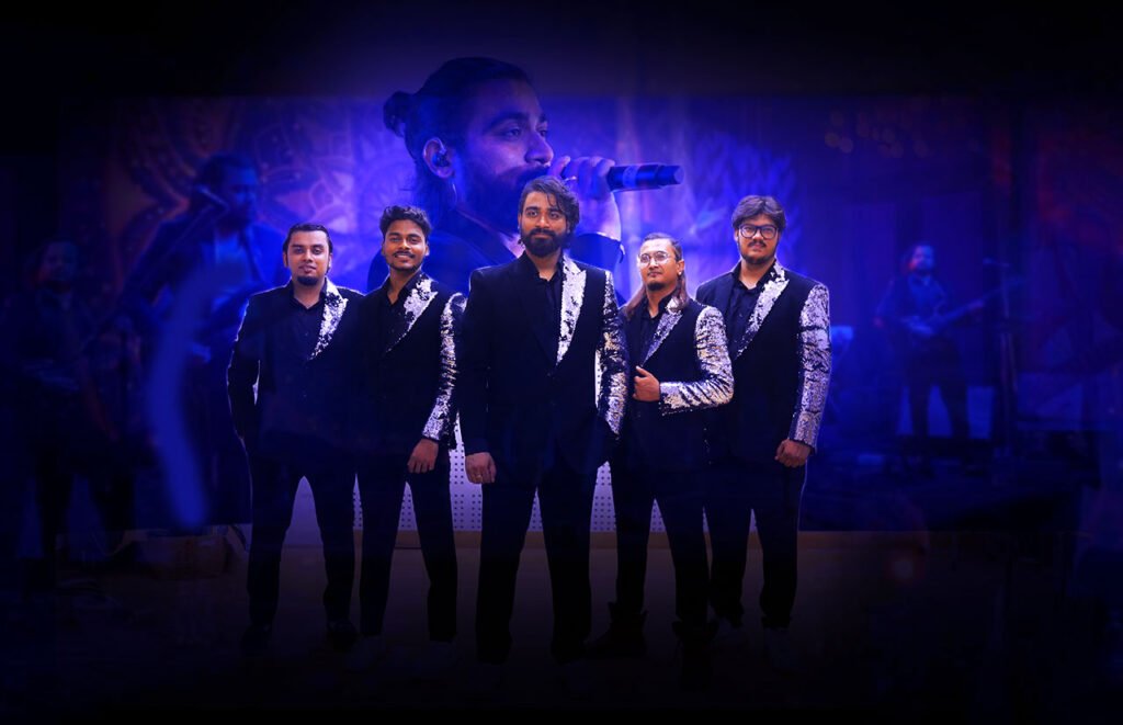 Whiskey Boys Band on stage at a lively wedding reception, dancefloor packed with guests.