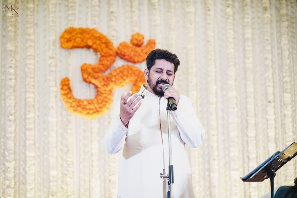 "Harish Moyal singing live with Mangal Naad Band during wedding pheras ceremony"