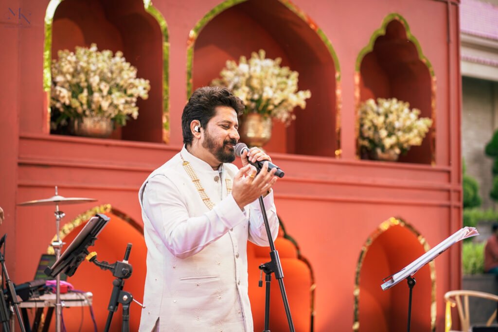 Live band performance during saat phere ceremony with mantras and melody


