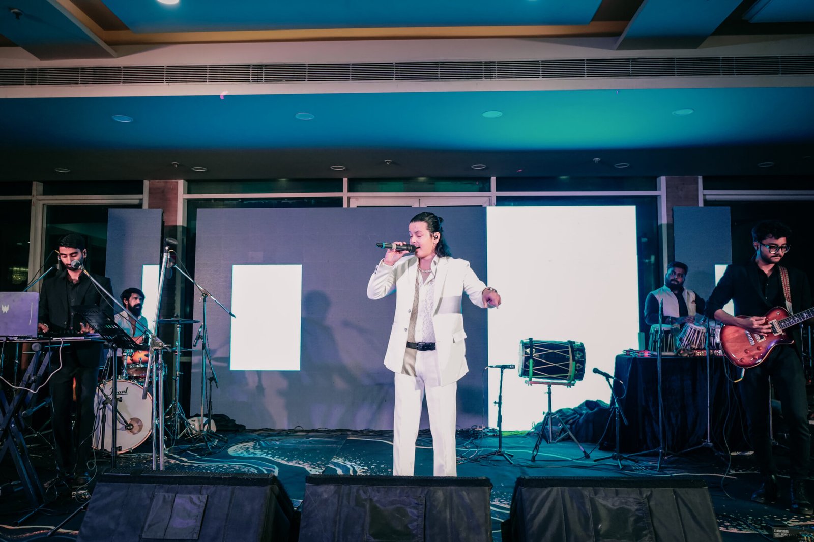 Lead vocalist of No Nonsense Band delivering high-energy live performance